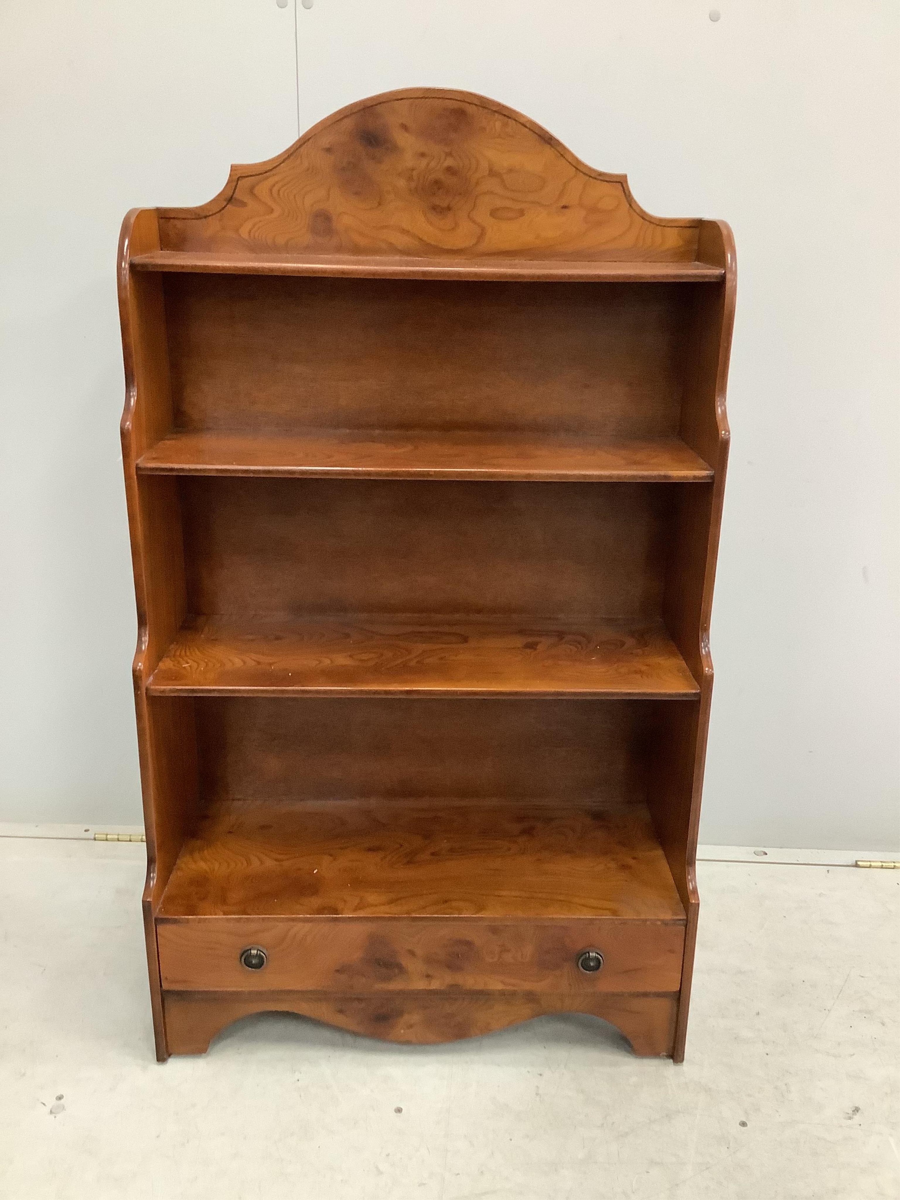 A reproduction elm graduated open bookcase, width 70cm, height 121cm. Condition - fair to good